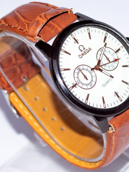 FIZ Stainless Steel Dial with a Classic Brown Color Leather Strapped Watch.